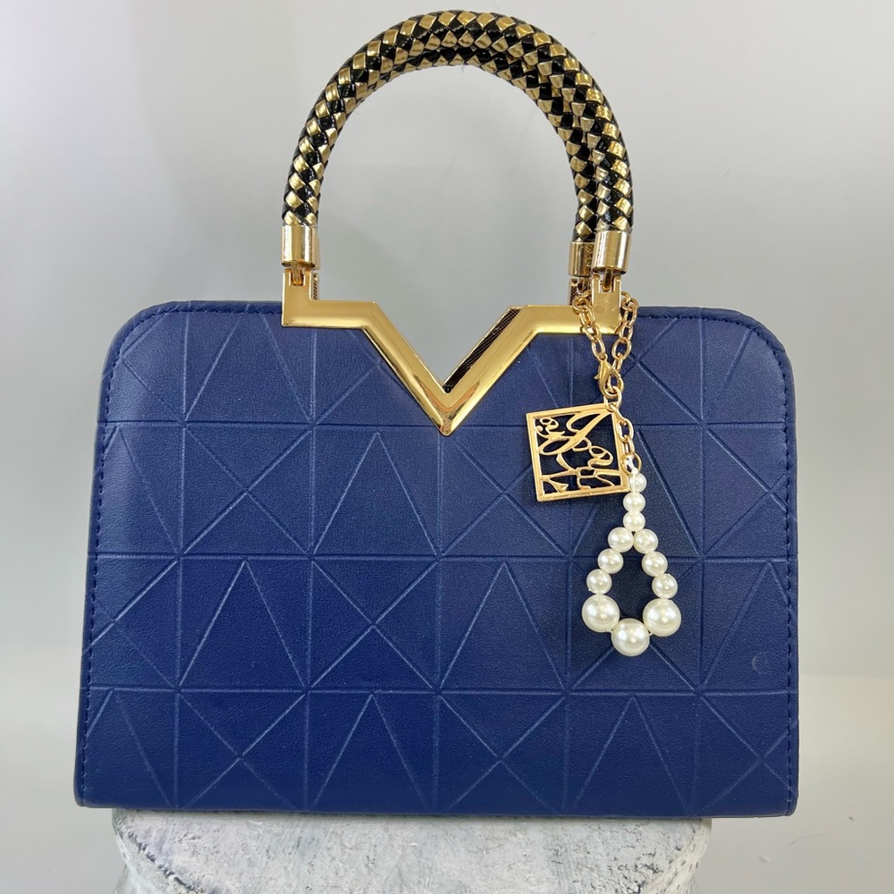 Elegant Faux Leather Blue Handbag with Gold Accents NWOT